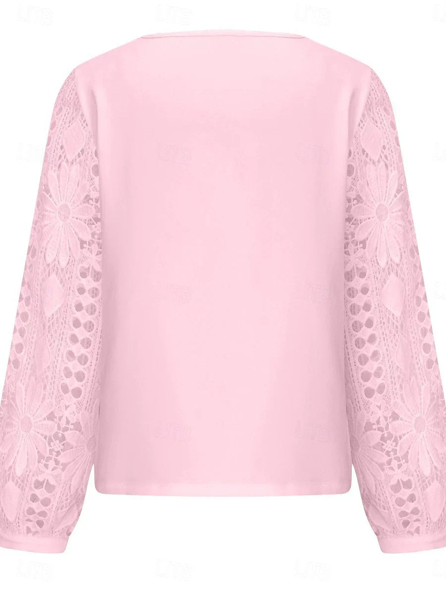 Blusa de encaje para mujer: elegante, manga larga, bordado calado y detalle asimétrico en patchwork. Ajuste regular, colores negro, blanco y rosa. Perfecta para verano, uso diario y vacaciones.