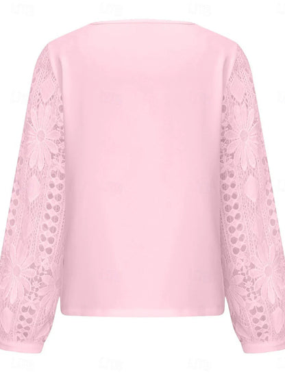 Blusa de encaje para mujer: elegante, manga larga, bordado calado y detalle asimétrico en patchwork. Ajuste regular, colores negro, blanco y rosa. Perfecta para verano, uso diario y vacaciones.